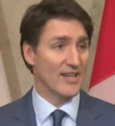 Trudeau with a look of disgust and annoyance